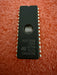 M27C256B-12F6 Microcontroller on a red textured background